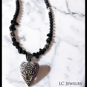 Necklace with Ouija Pendant black and silver semi-precious beads.